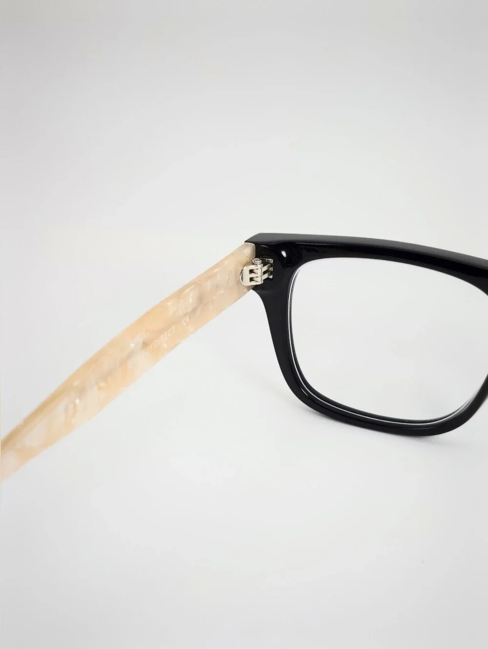 Fluoresce. Black Wayfarer-Style Eyeglasses with Pearl Temples.